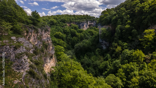 Beautiful nature. Mountain landscape. Sunny summer day. Green trees grow on the mountains.