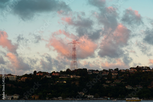Electricity tower at sunset with clouds