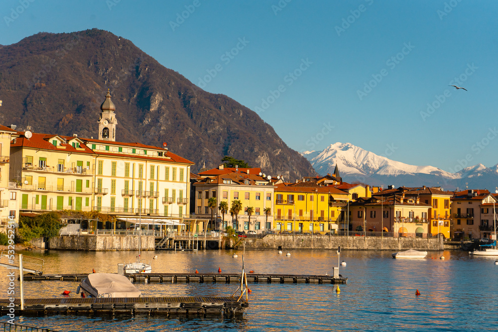Menaggio , port , beautiful town at Lake Como , Lombardy .  during autumn , winter sunny day : Lake Como , Italy : December 7 , 2019