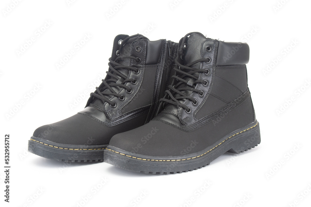Pair of new winter boots close up on white background Pair of new winter boots close up on white background