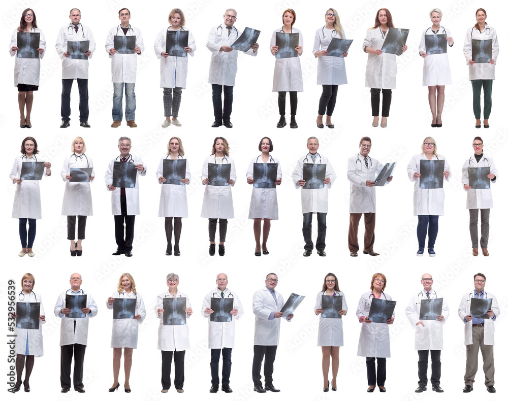 group of doctors holding x-ray isolated on white group of doctors holding x-ray isolated on white