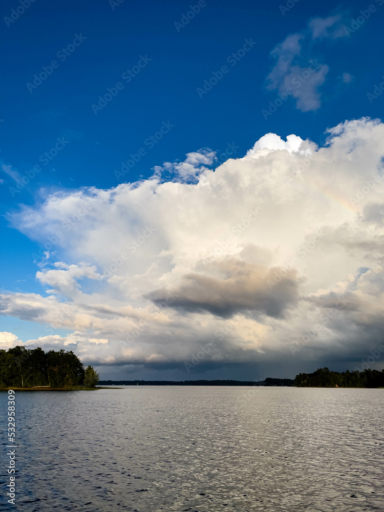 Rain clouds in the distance on Lake Nokomis in Tomahawk, Wisconsin