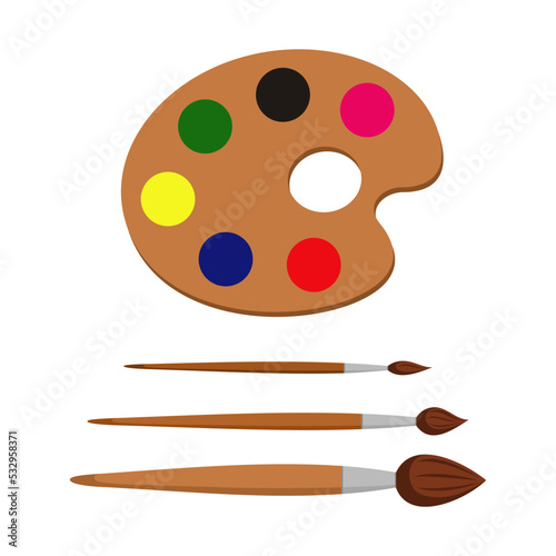 Drawing kit -brushes and palette on a white background.