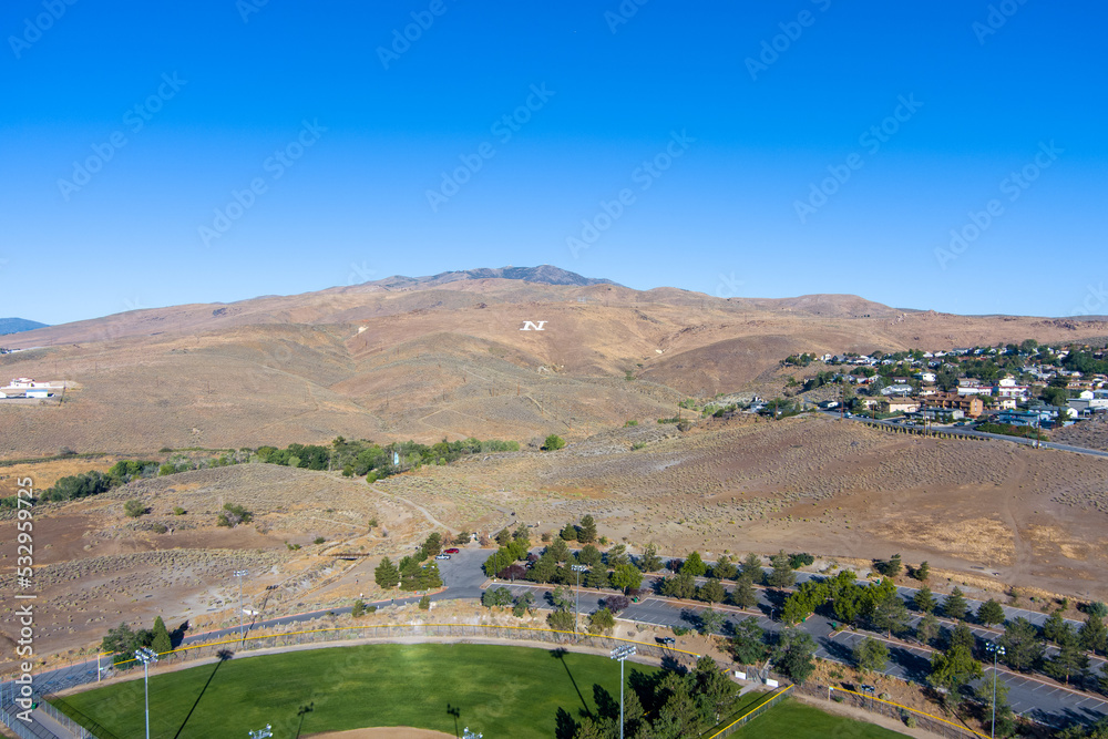 Aerial view of mountains near Reno Nevada with a large painted 