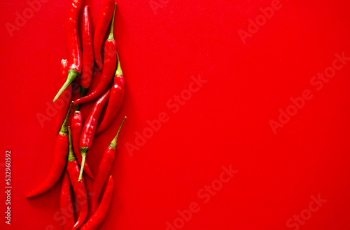 red hot chili peppers on red background