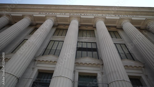 Front facade of the Bureau of Engraving and Printing in Washington, DC part of the Department of the Treasury with blue sky. photo