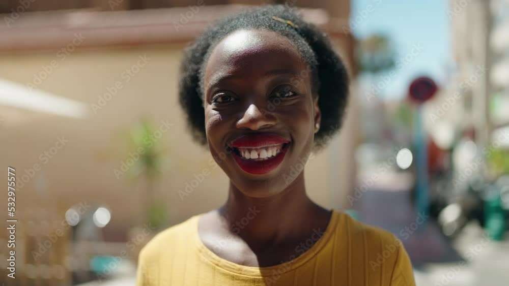 African american woman smiling confident standing at street African american woman smiling confident standing at street