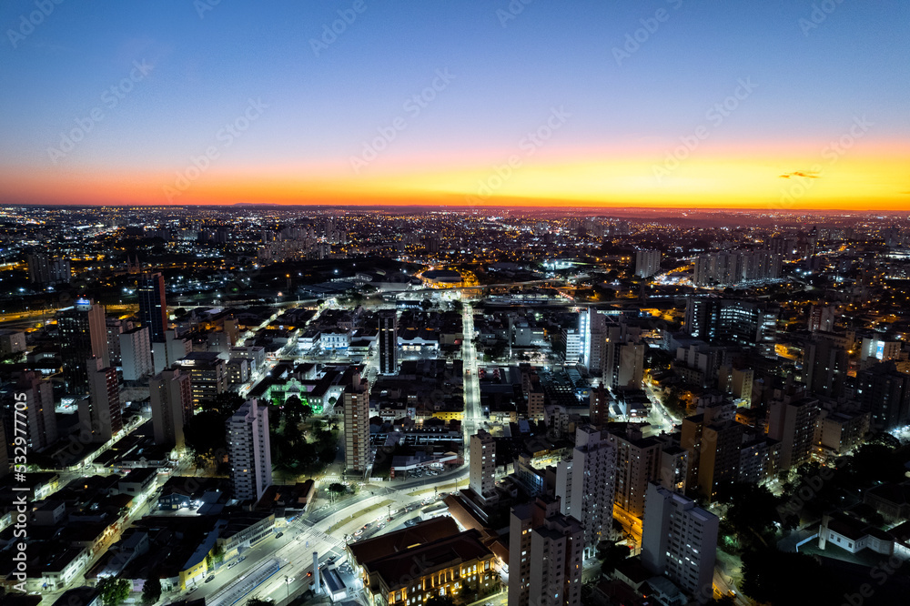 Central region of the City of Campinas with buildings, avenues and cars in the early evening. Francisco Glicério Avenue, Orosimbo Maia Avenue and City Hall area.