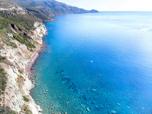 Aerial view of the blue sea of Sardinia west coast