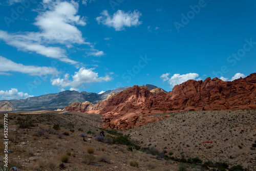 Red Rock Canyon Mountains with Blue Sky and White Clouds