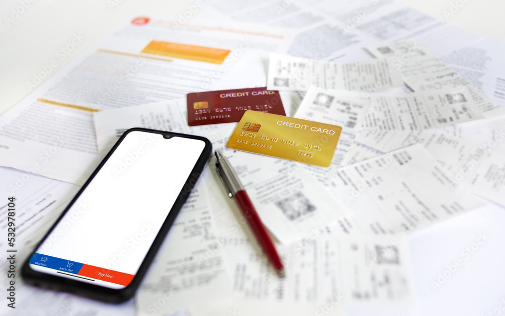 Focus on smart phone with icon bar on screen with credit card and bank statement, many bill and  from buying via credit card, Online shopping concept
