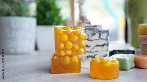 Natural handmade soap on green grass as nature. Salt soap healthy skin cleaning. Bath soap for body and face. Hygiene product.