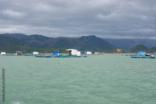 Floating houses in Nha Trang bay photo