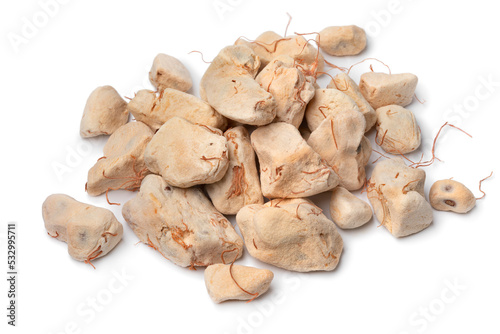 Heap of Baobab fruit pulp close up isolated on white background