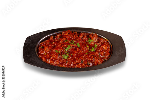 Kheema / keema or Khima is a spicy curry dish made up of minced chicken or lamb cooked with onion, tomatoes, served with buns. selective focus photo