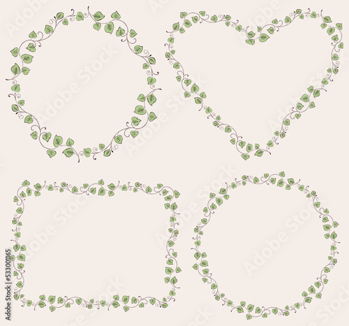 Decorative borders from outlines delicate twigs with green leaves and tendrils