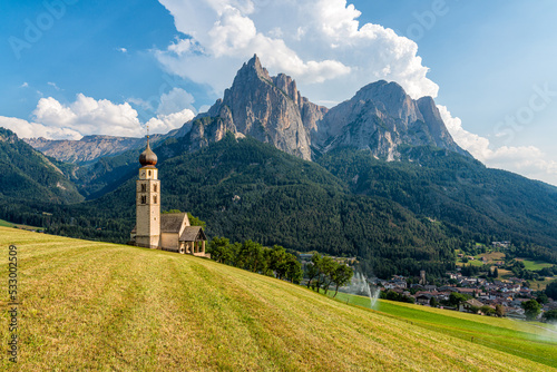 Beautiful view with the Church of San Valentino and the Sciliar Massif. Castelrotto, Bolzano, Trentino Alto Adige, Italy.
