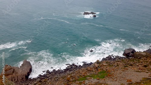 Beautiful ocean coastline view: panning from the 100 meters rock