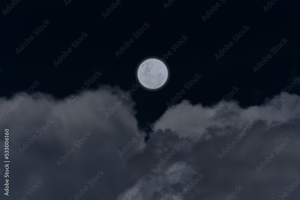Full moon with clouds in the sky. Full moon with clouds in the sky.