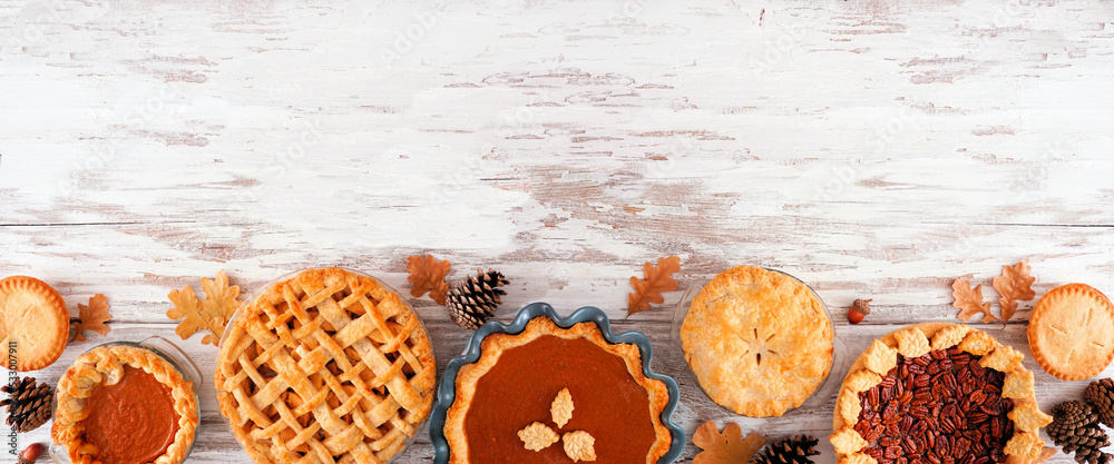 Assortment of homemade fall pies. Pumpkin, apple and pecan. Top down ...