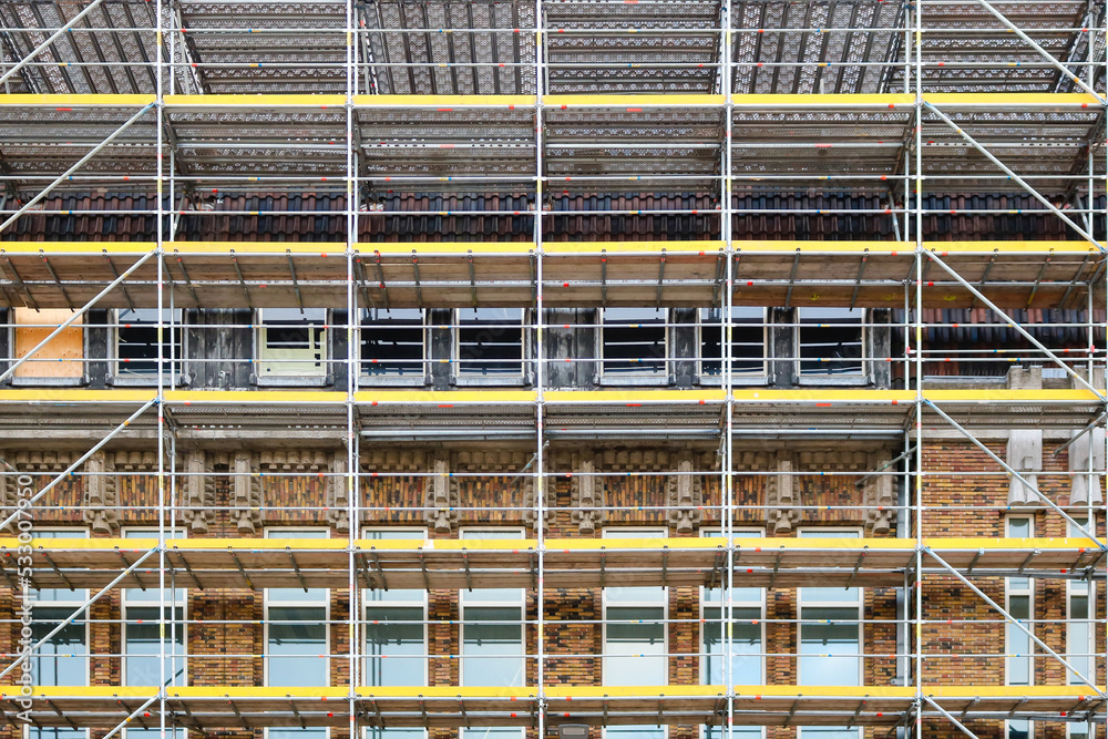 Scaffolding for renovation works on brick building
