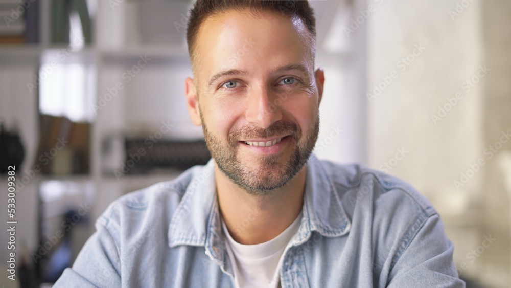Portrait of young adult man at home. Happy, confident, smiling. Portrait of young adult man at home. Happy, confident, smiling.