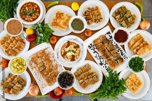 Wallpaper Mural Delicious meat kebab with fresh vegetable salad served with variety of Turkish dishes and appetizers. Top view of assorted Turkish food and meze, tasty and healthy Mediterranean cuisine. Torontodigital.ca