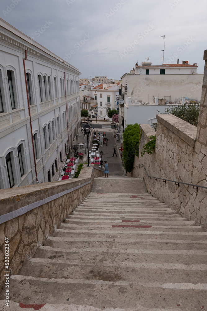 Vieste, Foggia, view of the stairs of love. Historic center, huge white stairs with red hearts of passion.