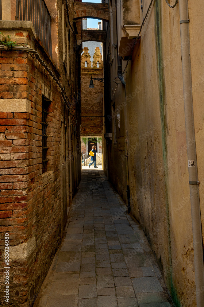 narrow street in the town Venice, Italy