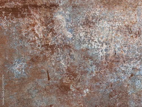 Beautiful rusty metal surface. There are shades of white and blue