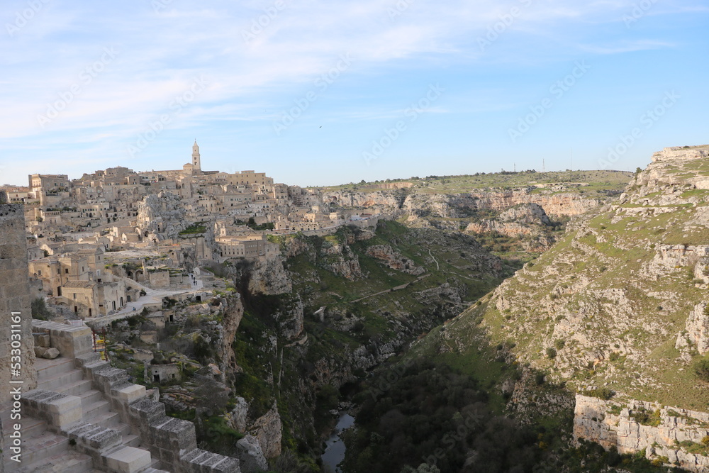 Hiking along the gorge of Matera, Italy