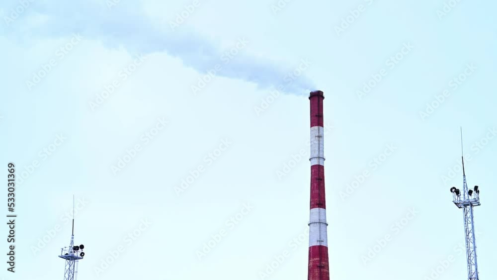 Gas combined heat and power plant with pipes, smoke, steam, power stations on a frosty winter day. The use of natural gas in the heat and power industry. Crisis of lack of natural gas. Gas combined heat and power plant with pipes, smoke, steam, power stations on a frosty winter day. The use of natural gas in the heat and power industry. Crisis of lack of natural gas.