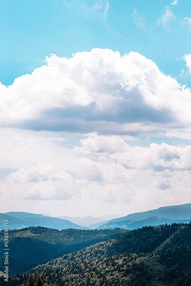 Mountain range of the Ukrainian Carpathians in summer with a tonal perspective. High quality photo