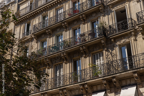 Fragment of the facade of a historic building in the center of Paris.
