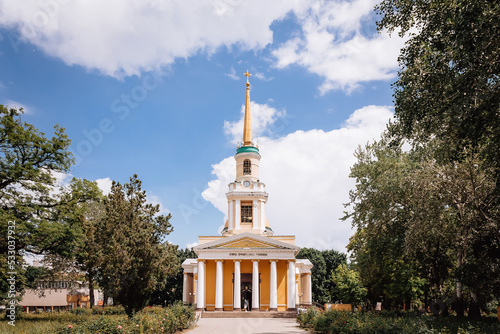 Church in the park in Ukraine among the crowns of trees. High quality photo photo