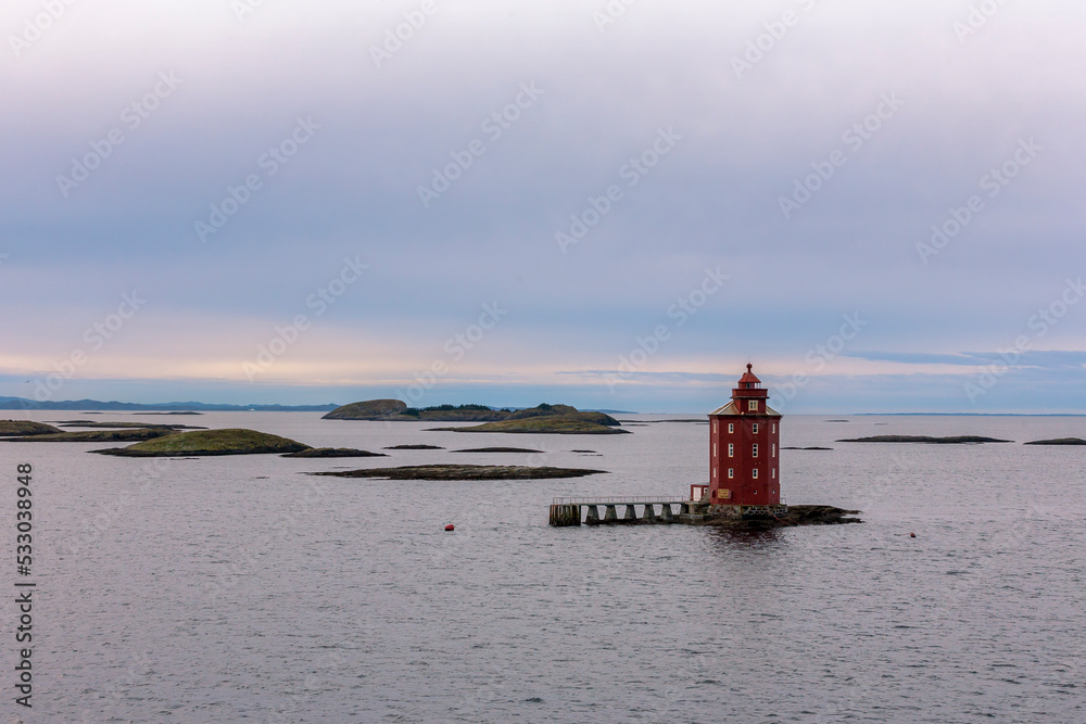 The lonely Kjeungskjær Lighthouse at the mouth of the Bjungenfjorden, Ørland, Trøndelag, Norway