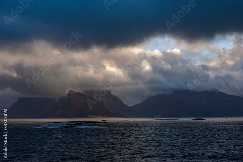 Stormy skies over Storvika and the mountain of Årfjellet on the Gildeskål coast, Nordland, Norway