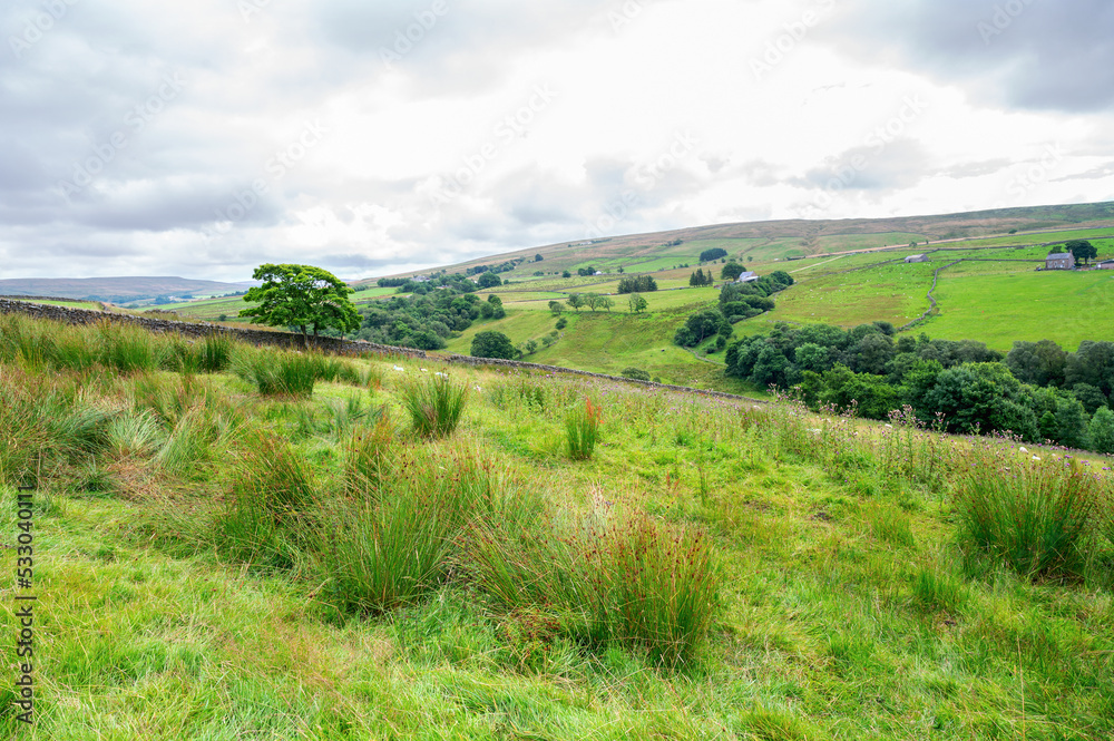 Walking Pennine way near Cumbria. The landscapes around Alston town, highest market settlement in England, selective focus Walking Pennine way near Cumbria. The landscapes around Alston town, highest market settlement in England, selective focus