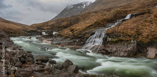 Stunning Winter landscape image of River Etive and Skyfall Etive Waterfalls in Scottish Highlands