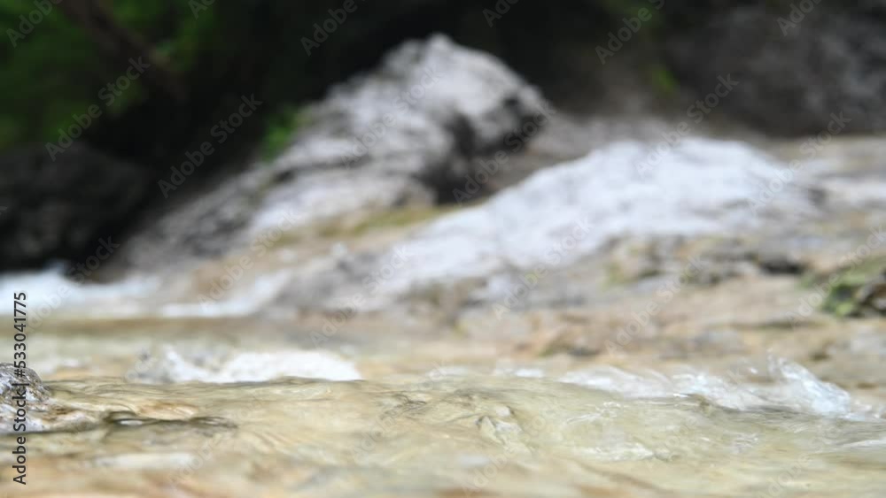 Closeup of water in a rocky mountain river (bokeh) Closeup of water in a rocky mountain river (bokeh)