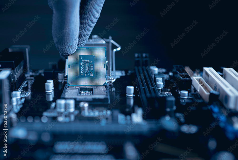Engineer repairman computer uninstall CPU microprocessor to motherboard socket. the concept of Computer technology and hardware maintenance or repair.