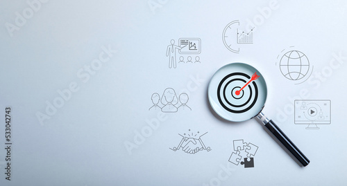 Konstfotografi Target board inside magnifier glass on gray background