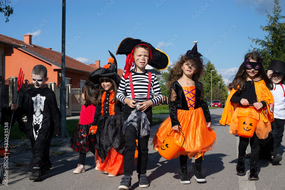 Happy group of kids on Halloween
