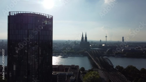 skyline of Cologne with Kölntriangle and cathedral from above with famous cologne view from rhine river side with Hohenzollern bridge in front photo