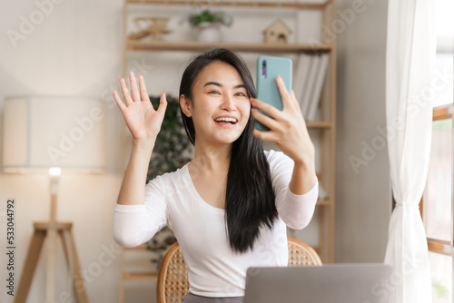 Calm single young asian woman relax at work home office.