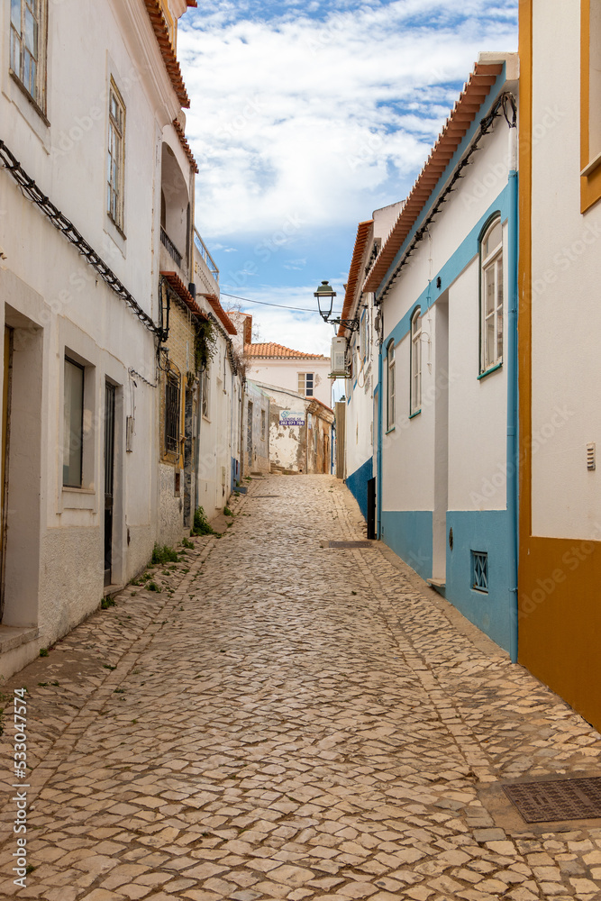 Narrow and colorful streets of the village of Ferragudo, Algarve, Portugal