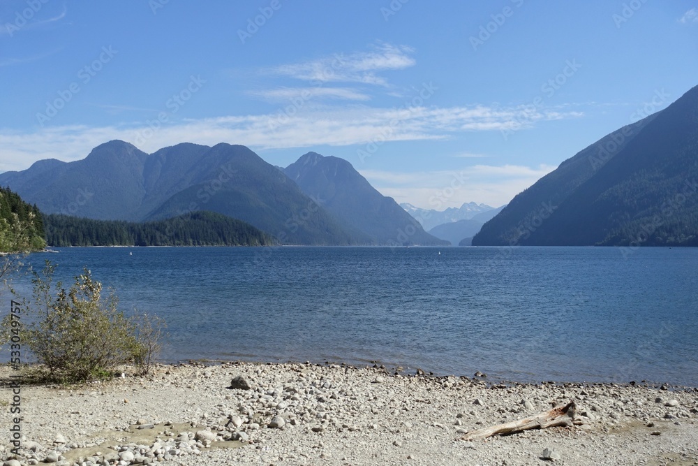 A beautiful view of Alouette Lake surrounded by mountains on a sunny summer day in Golden Ears Provincial Park, Maple Ridge.