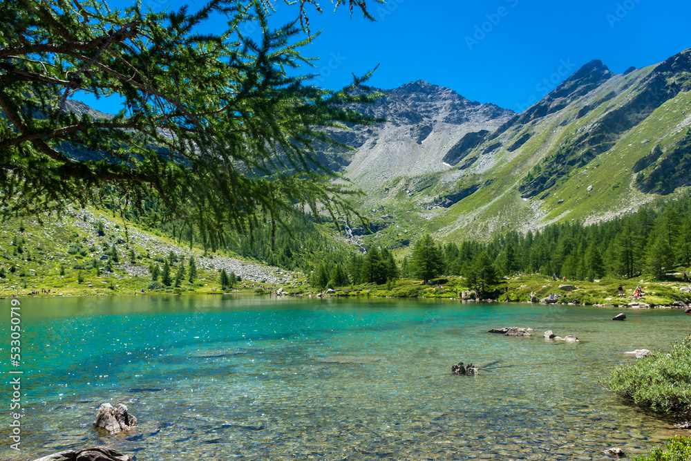 Ταπετσαρία Morgex, Italy, 10 July 2022:  The beautiful crystal clear water of the Arpy Lake