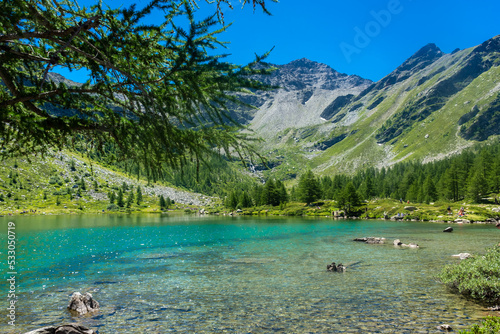 Photos Morgex, Italy, 10 July 2022:  The beautiful crystal clear water of the Arpy Lake