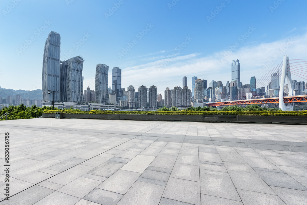 empty square floor with modern city background
